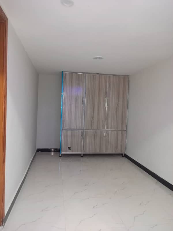 Upper portion house 1.5story available for rent location main haji cam double road. 17