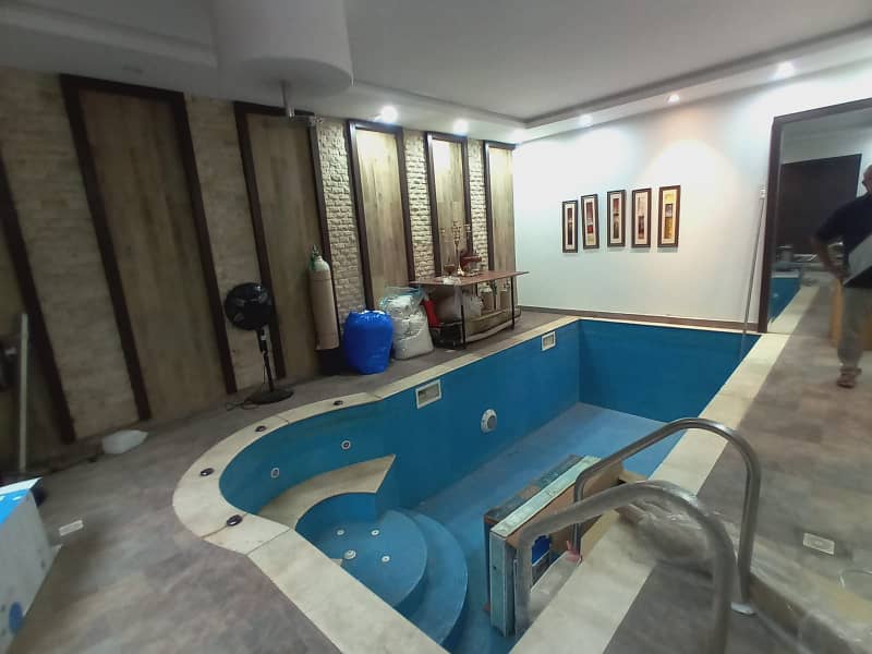 DHA Lahore 2 Kanal Faisal Rasool Design House Fully Furnished And Full Basement With Swimming Pool With 100% Original Pics Available For Sale 22