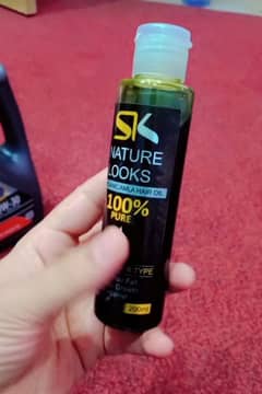 SK Nature looks organic Amla+ hair oil  03131611122