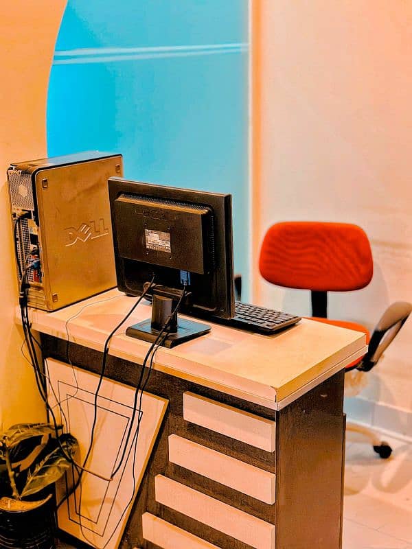 Reception table along with PC and chair 1