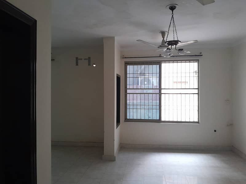 2 Kanal Double Unit House on Rent on Main Airport Road Phase 1 DHA Lahore . big lawn & Garden and parking 0