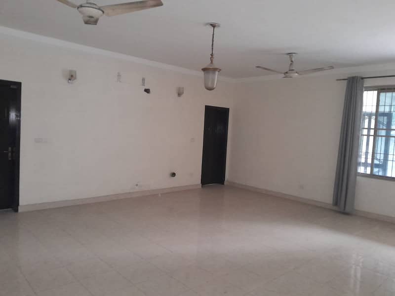 2 Kanal Double Unit House on Rent on Main Airport Road Phase 1 DHA Lahore . big lawn & Garden and parking 17