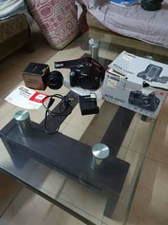 Canon Eos 4000d with box and 50mm F1.8 lens.