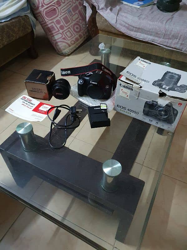 Canon Eos 4000d with box and 50mm F1.8 lens. 0