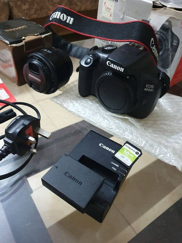 Canon Eos 4000d with box and 50mm F1.8 lens. 7