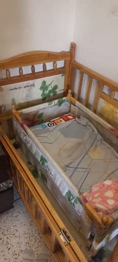 wooden baby cot with wheels