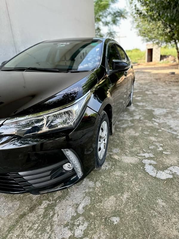 Toyota Corolla XLI 2016 converted into GLI fully automatic Door window 2