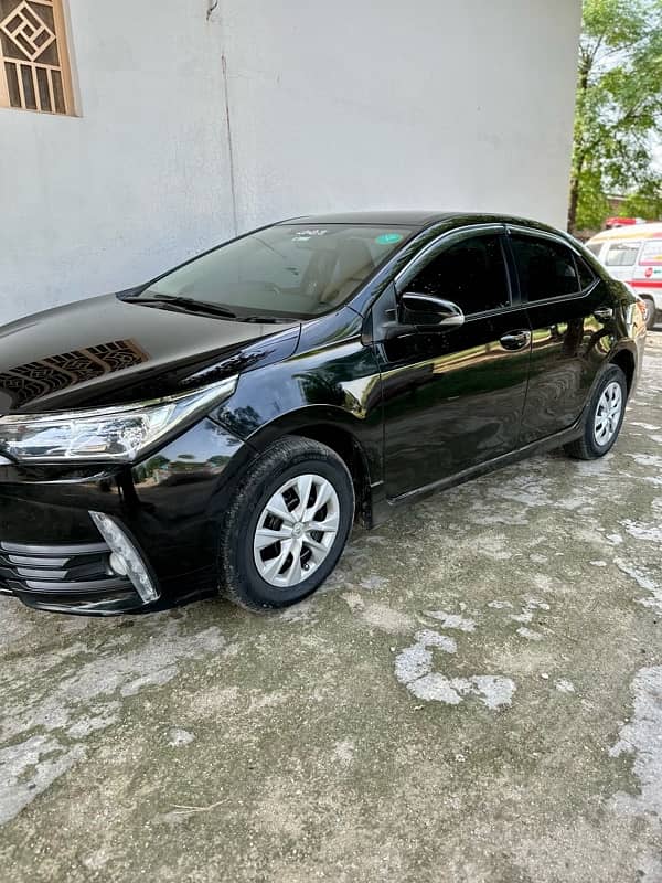 Toyota Corolla XLI 2016 converted into GLI fully automatic Door window 3