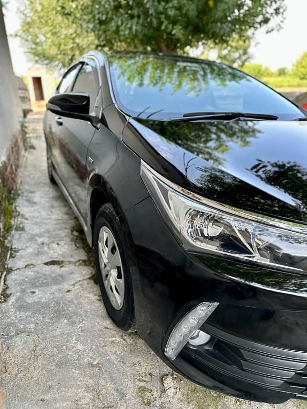 Toyota Corolla XLI 2016 converted into GLI fully automatic Door window 5