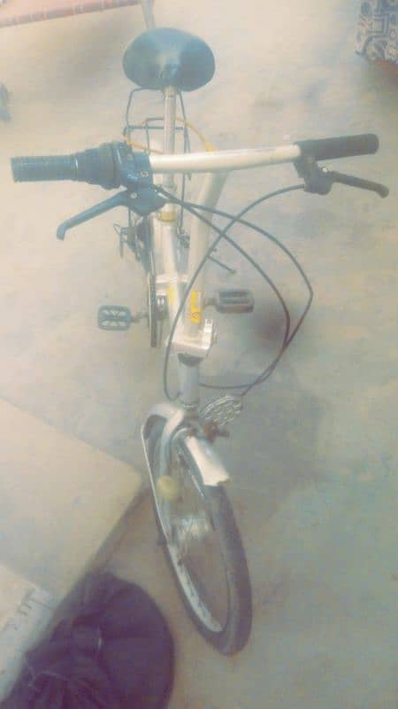 Folding bicycle with front headlight with front wheel Dynamo 4