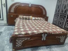 Wooden double bed used for sale with mattress