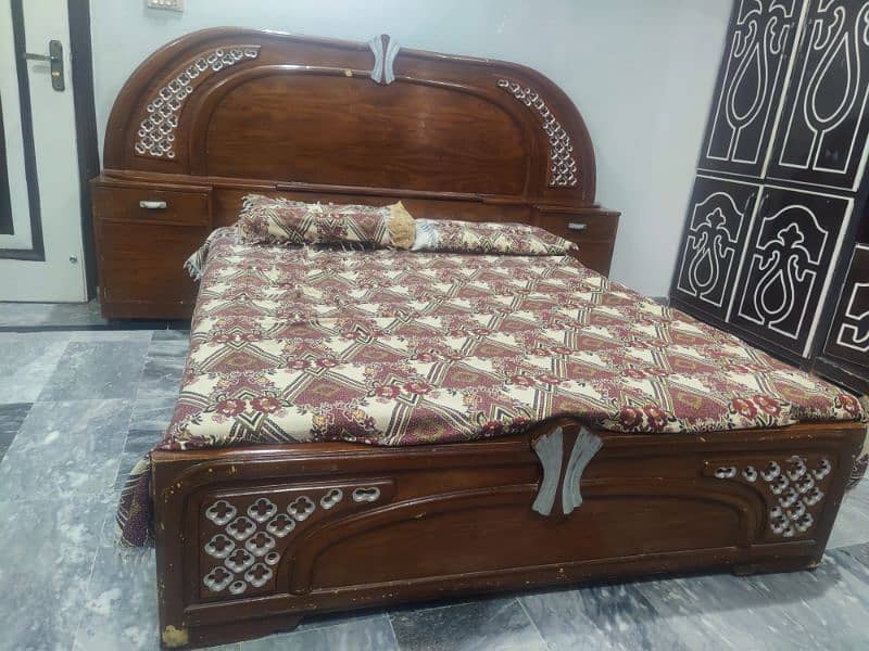 Wooden double bed used for sale with mattress 0