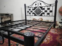 An iron double bed in good condition