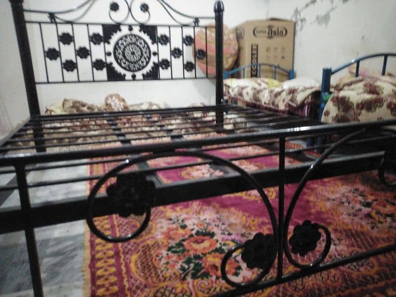 An iron double bed in good condition 2