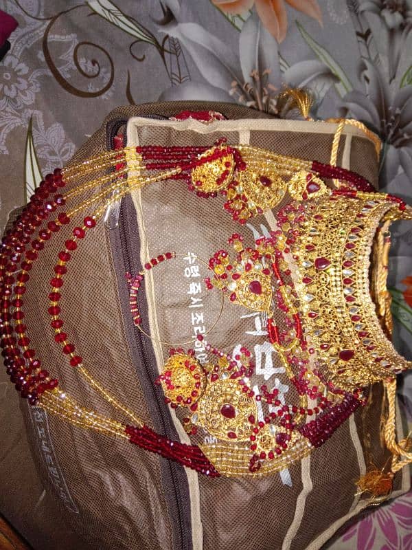 simple bridal lehenga with heavy TILA work . . . 7