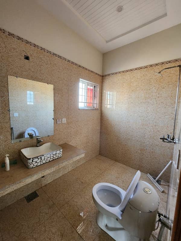 1 Kanal Upper Portion 3 Bed with attached bath for Rent on Hot Location is available for Rent DHA Phase 5 ,Lahore 1