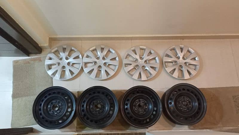 Honda Civic rebirth wheels and wheelcaps orignal 15" 0