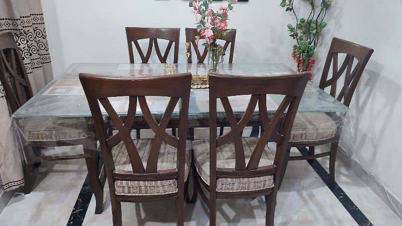 dinning table with 6 chairs - glass top 0