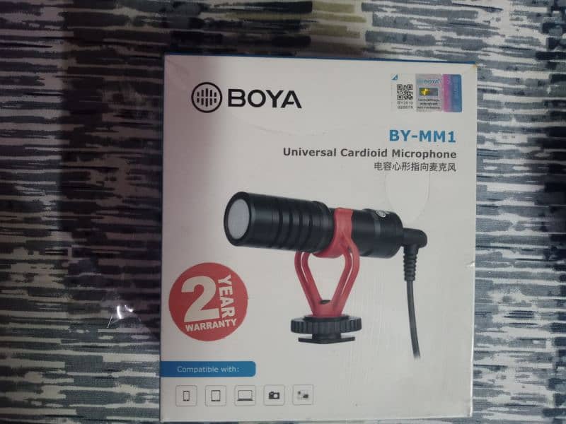 boya by mm1 professional vlogging mic for sale. 1