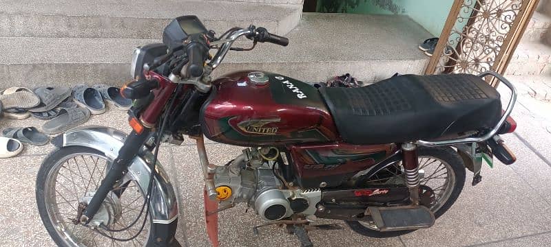 unaitad,70  cc 2022 modal 6