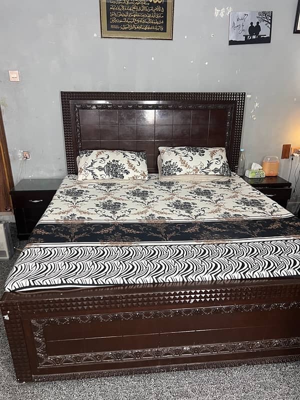 wooden double bed with sidetables 2