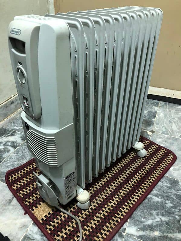 Imported electric oil+fan 12 fins model KH771230V 1