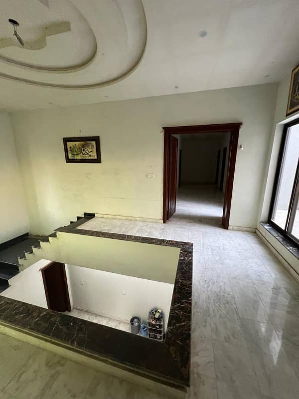 One Kanal House Facing Country Club Semi Complete (Tiles , Paint , Fittings , Wood Work) Available For Sale on Investor Price . Pay 3.75 Crore , Get House Possession, Start Finishing and Pay in Four Installments . Best Opportunity To Grab , Don't . 14