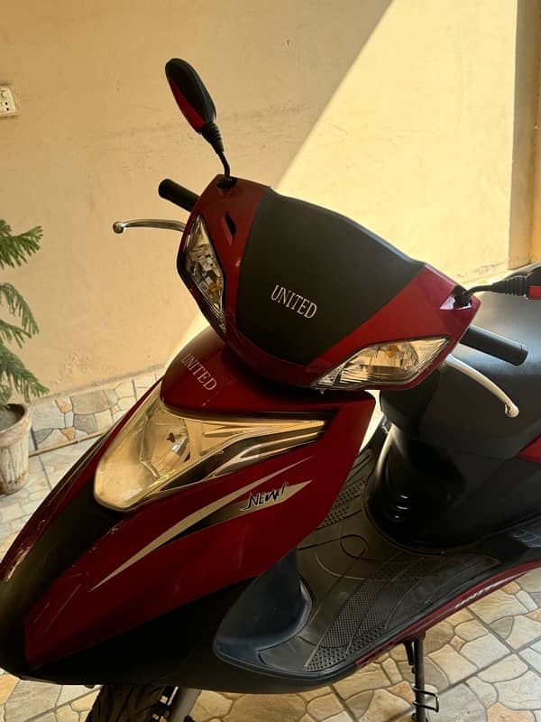 United scooty 100 cc 4