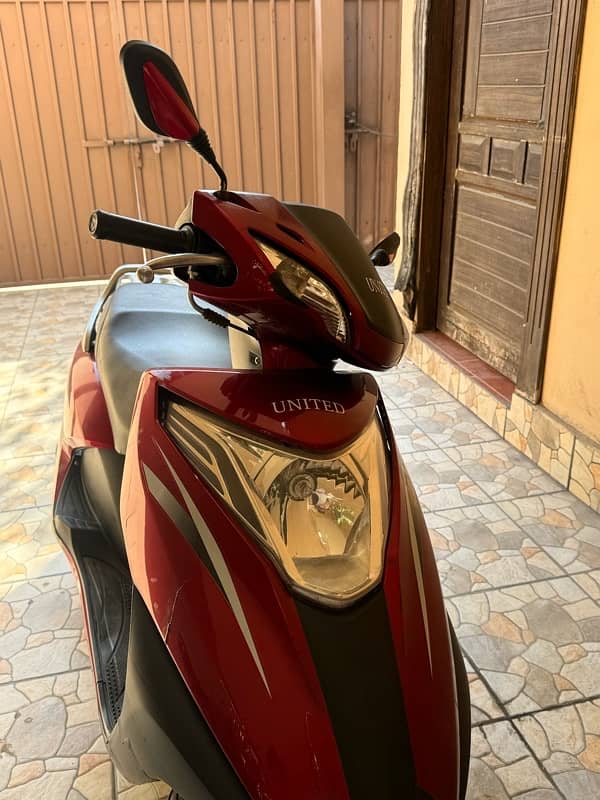 United scooty 100 cc 6