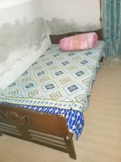 Single wooden bed