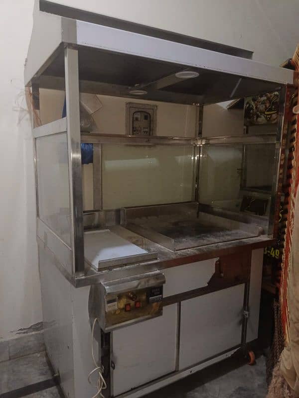 food counter with shawarma hot plate 0