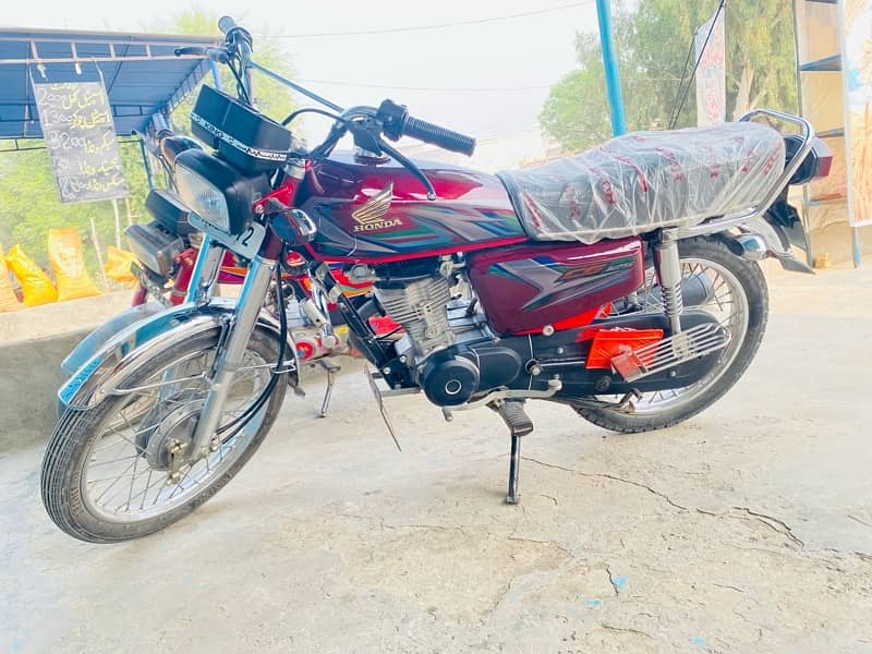 Honda 125, 23 Model 1