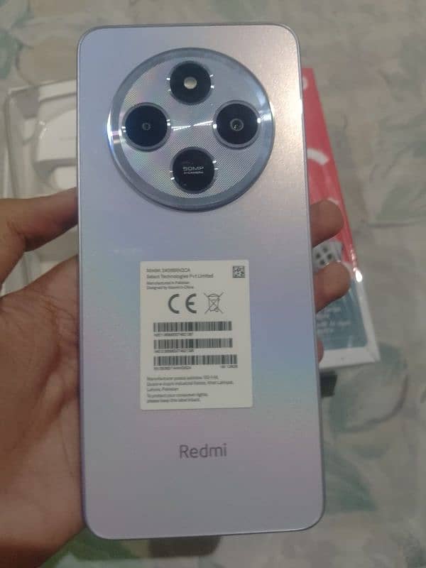 model redmi 14c ram 12.  rom 128 15 day use phone all ok 03142659279 1