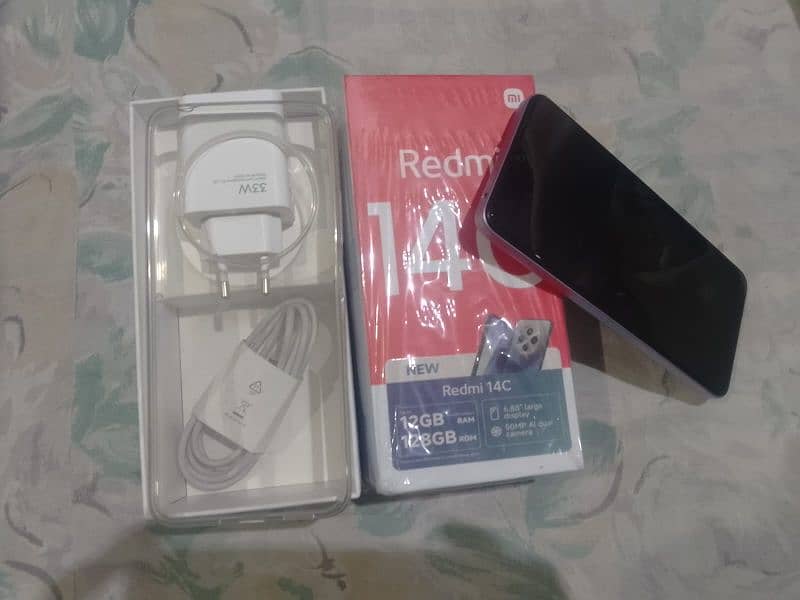 model redmi 14c ram 12.  rom 128 15 day use phone all ok 03142659279 5