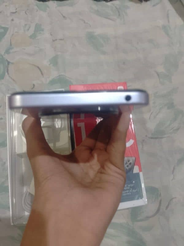 model redmi 14c ram 12.  rom 128 15 day use phone all ok 03142659279 6