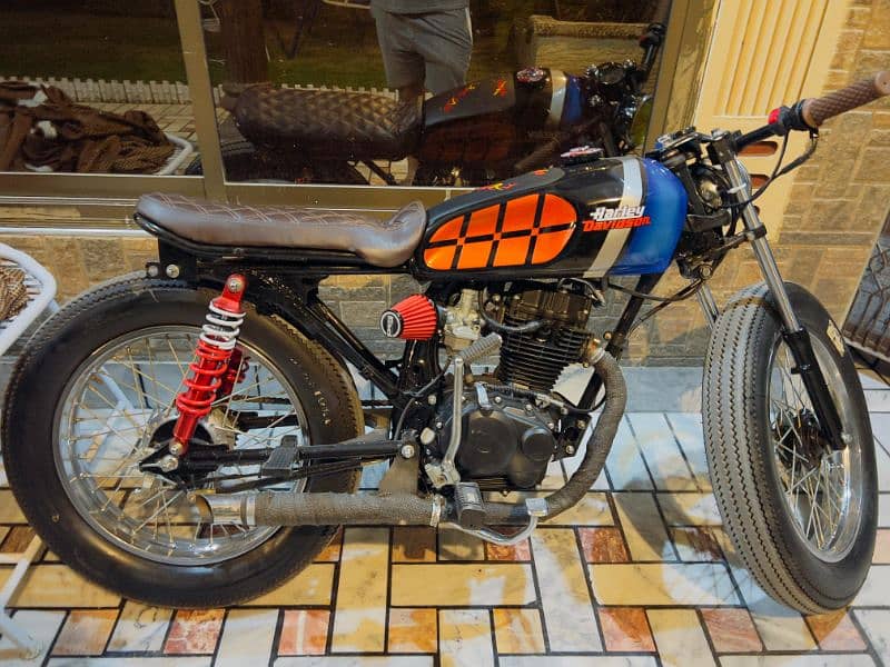 Honda 125 converted intocafe racer 0