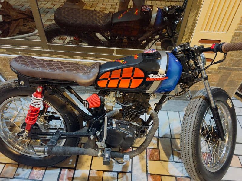 Honda 125 converted intocafe racer 1