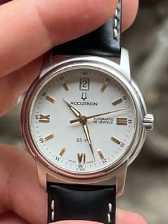 Bulova accutron automatic watch.