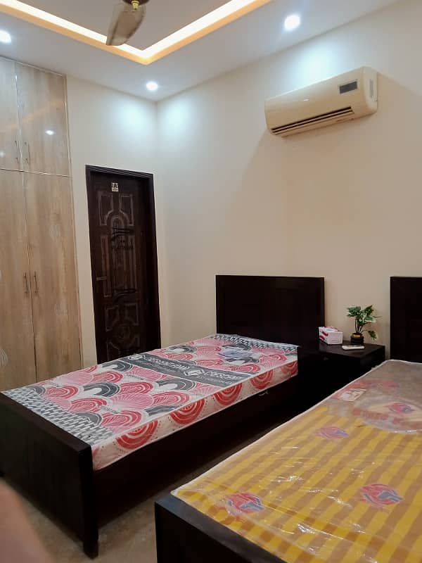 Furnish room per bed 21,000/- rent in alfalah town near lums dha lhr 9