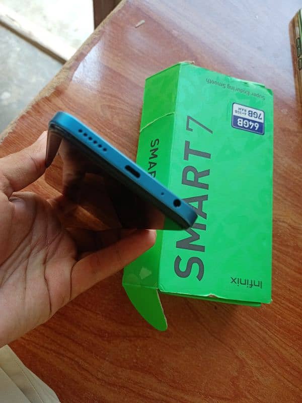 Infinix smart 7 4/64 with box and charger 2