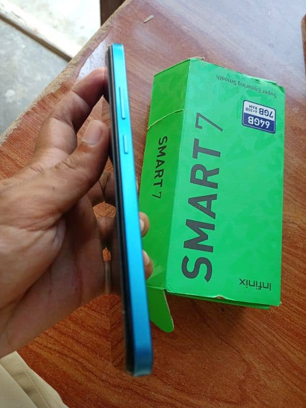 Infinix smart 7 4/64 with box and charger 3