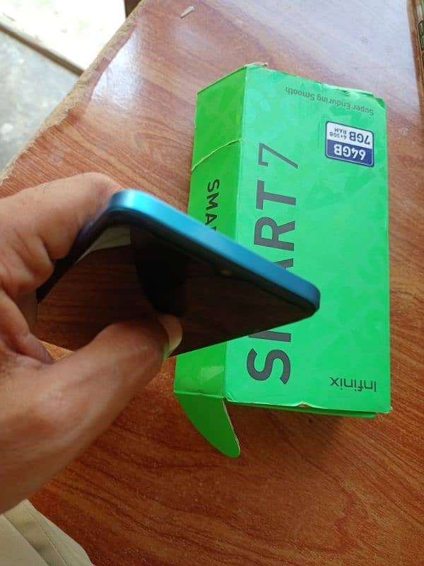 Infinix smart 7 4/64 with box and charger 4