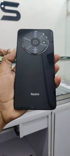 Redmi A3  in 10 by 10 condition with original box and charger,4.128