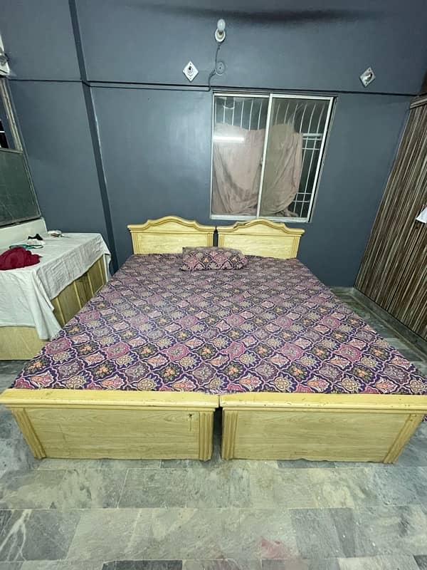 2 single bed with study table and large divider 0