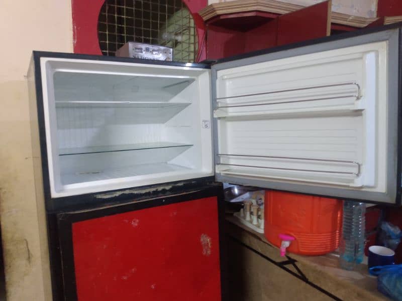 Dawlance Refrigerator for sale urgent 8 by 10 Condition 5 years used. 4