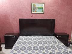 King Size wooden bed in new condition with dressing and side tables