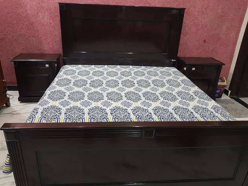 King Size wooden bed in new condition with dressing and side tables 1