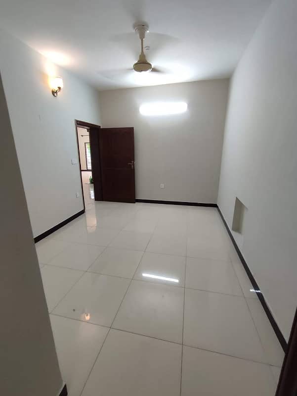 9 BEDROOMS TRIPLE STOREY HOUSE FOR SALE IN I-8 ISLAMABAD. 7