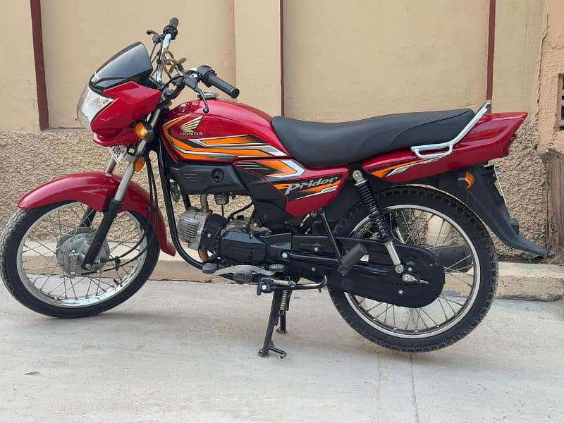 honda 100 Red punjab number 2