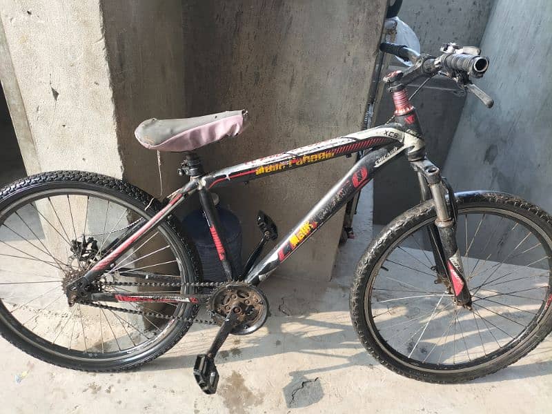 bicycle with 7 gear red and black colour 0